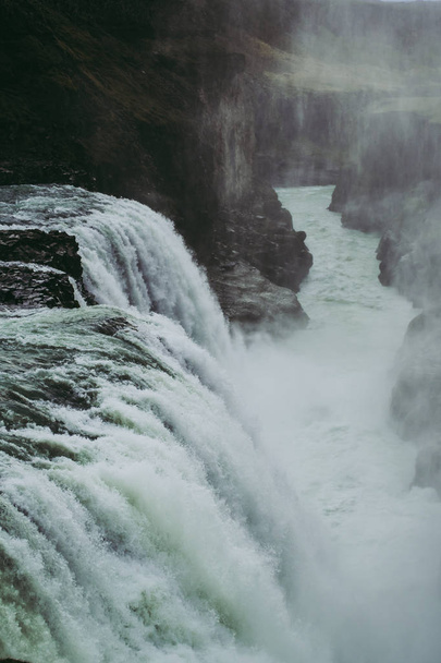 The edge of the Gullfoss waterfall and splashes flying over it - Valokuva, kuva