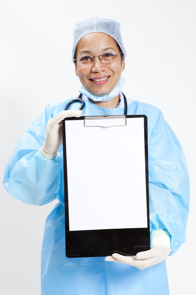 Doctor whit notepad a over white background - Foto, Imagen