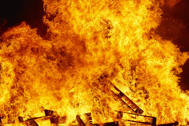 Fire flames on a bonfire. Fireman emergency. Danger combustion - Photo, Image