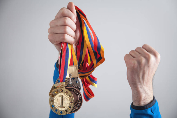Sportler mit Medaillen. Sport, Sieger, Erfolg - Foto, Bild