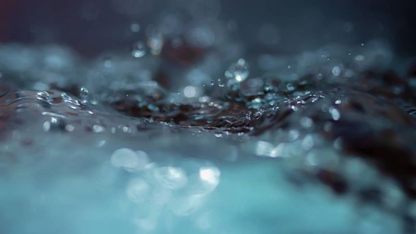 Water wave abstract background bokeh and droplets. - Foto, immagini