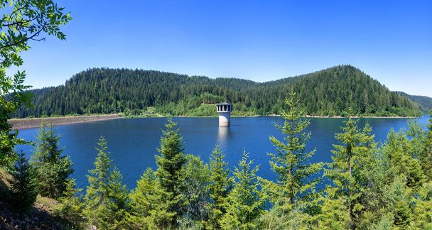 Tower in the Kleine Kinzig Dam near Alpirsbach, in the Black Forest, Germany - panorama with dam on the left - Photo, Image