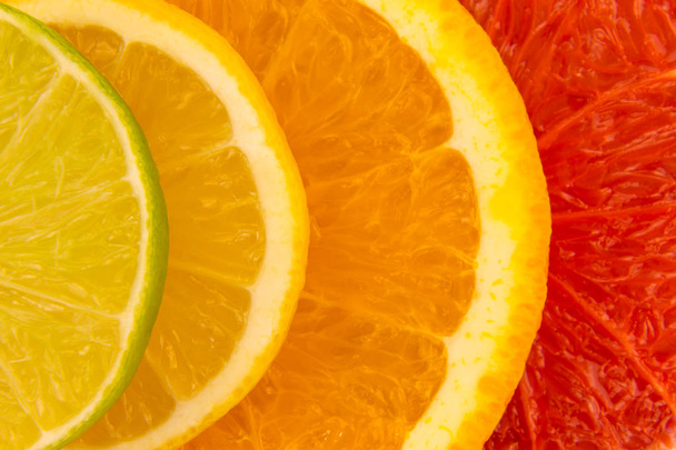 Négy szelet citrusfélék, Vértes háttér. - Fotó, kép