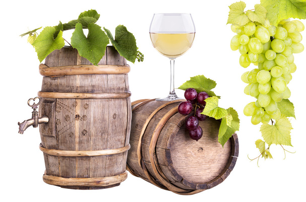 Grapes with wine glass and wooden vintage barrel - Фото, зображення