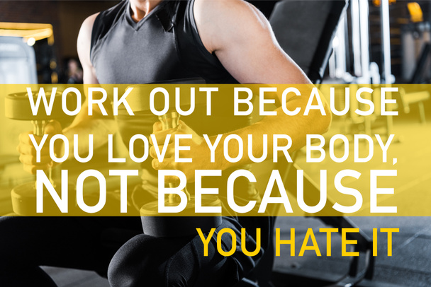cropped view of athletic man working out with dumbbells in gym with work out because you love your body, not because you hate it illustration - Foto, imagen
