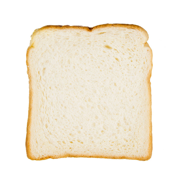 Close-up image of one slice of white bread against the white bac - Valokuva, kuva