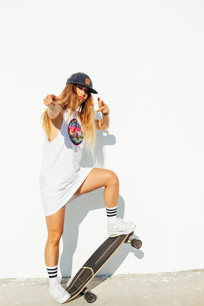 Beautiful Hipster Girl With Skate Board - Photo, image