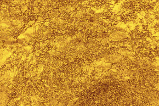 gyűrött arany fólia textúra háttér - Fotó, kép