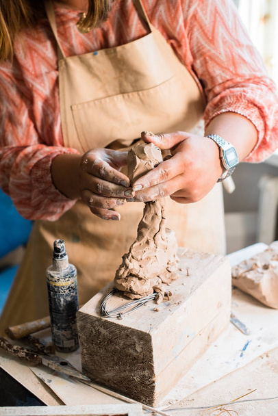 Lady sculptor working in her studio, ceramis artists hands - Photo, Image