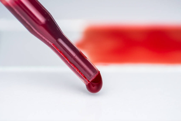 medical pipette with blood close-up - Foto, Imagen