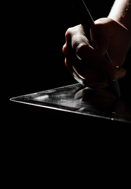 Digital Signature Concept. female hands digitally sign a digital tablet on black dark background with copy space. - Foto, Imagen