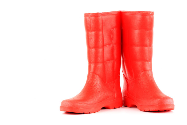 botas de lluvia rojas aisladas sobre fondo blanco
 - Foto, imagen