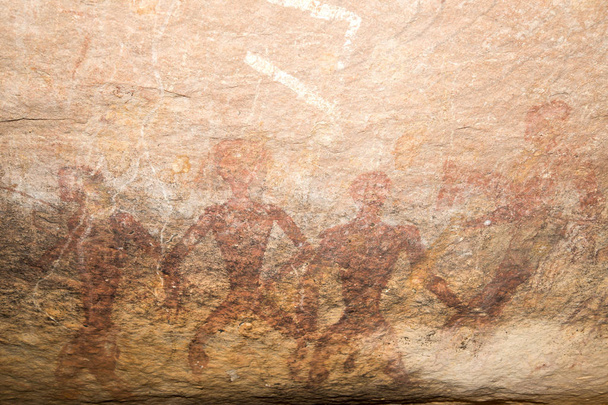pinturas rupestres en la pared, pintado de roca ocre
.  - Foto, Imagen