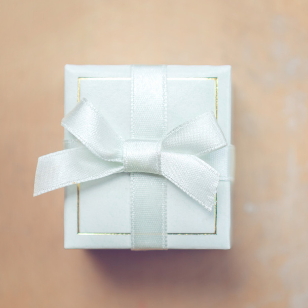 Gift box with white ribbon - Foto, Imagen