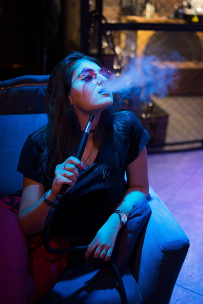 Attractive eastern woman smoke Asian, Arabian hookah - Photo, image