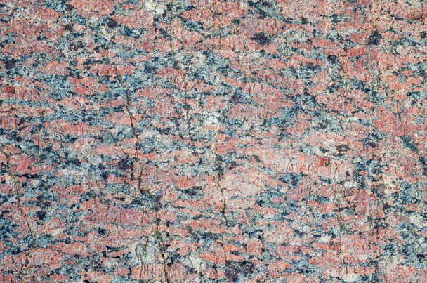 Surface of a granite stone, texture background - Foto, afbeelding