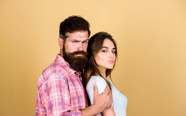 So close. Man hug pretty woman. Bearded hipster cuddle with brunette girl. Feel his passion. Tender touch. Sensual couple in love. Love concept. Support protect marriage. Romantic coupe. Love feeling - 写真・画像