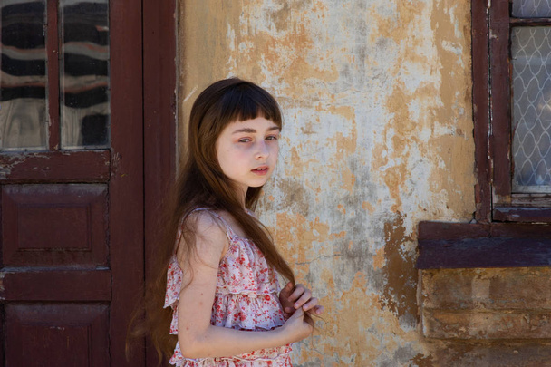 Adorable happy little girl outdoors. Portrait of caucasian kid enjoy summer. - Photo, Image