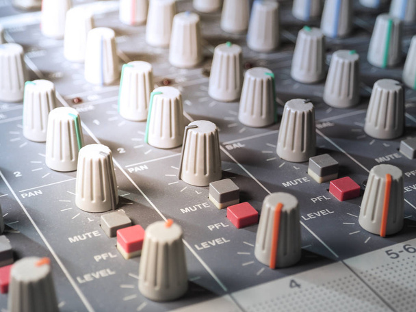 Sound equalizer mixing. Professional studio equipment for sound mixing. Music studio image. Close up and selective focus. - Photo, Image