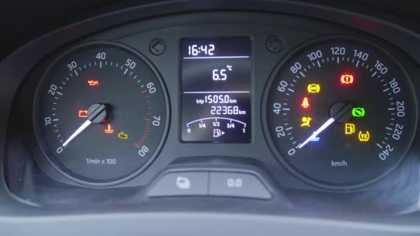 Car dashboard details with indication lamps, visible speedometer and fuel level - Footage, Video