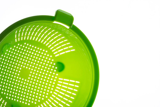 Close-up van een groene Plastic vergiet - Foto, afbeelding