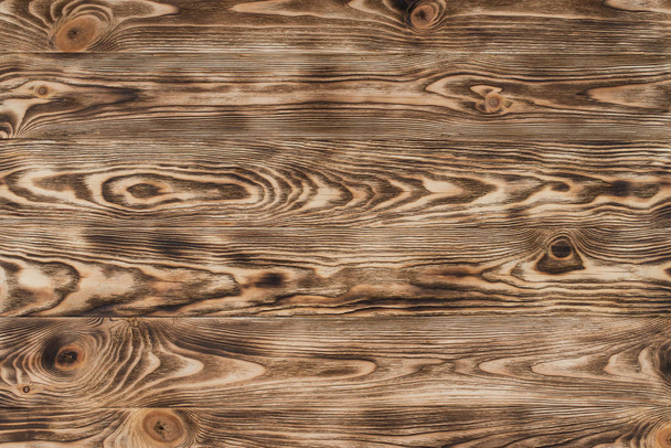 brown burnt wood texture horizontally - Fotografie, Obrázek