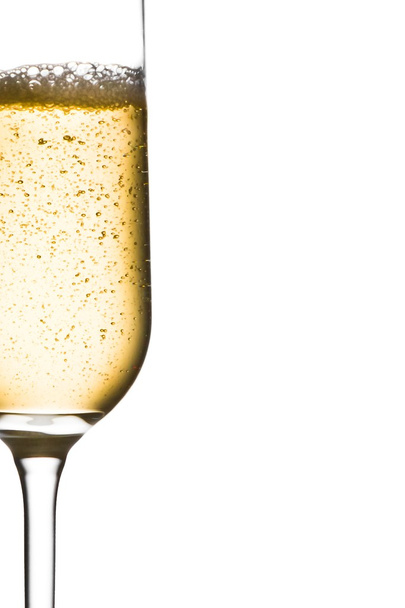 half glass of champagne with bubbles and space for text - Foto, imagen