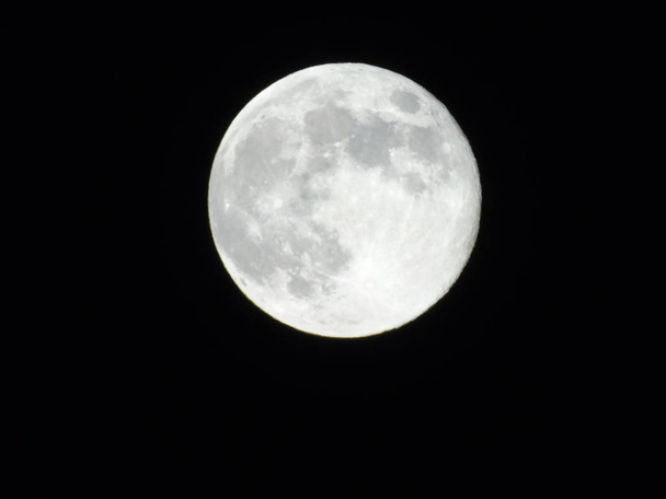 Full Moon Isolated on Black Background in summer days - Photo, Image