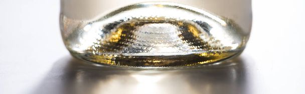 close up view of bottle with white wine and back light, panoramic shot - Photo, Image