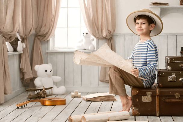 Portrait of a boy in an image of the traveler - 写真・画像