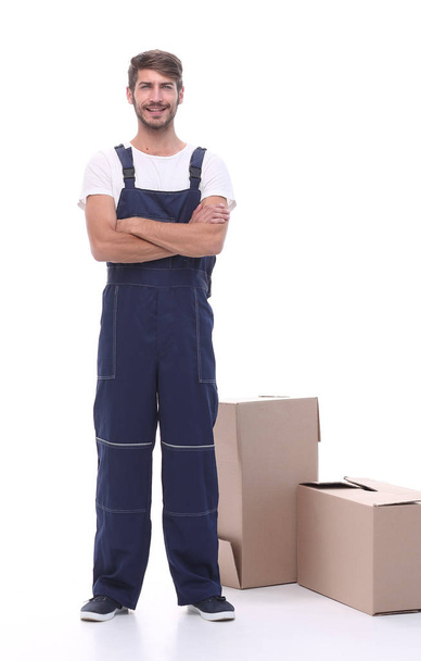 man courier standing near cardboard boxes - Фото, зображення