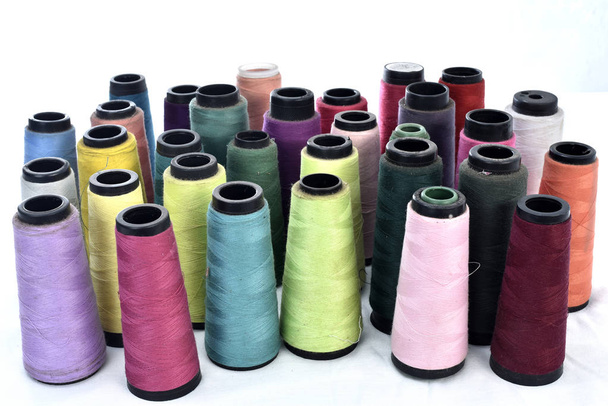 Colorful sewing thread reels on white background - Photo, Image