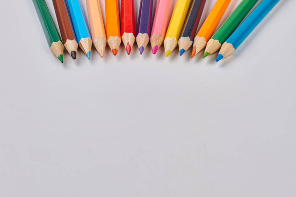 Color pencils on white background. - 写真・画像