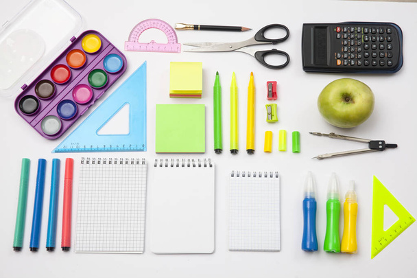 Preparation of primary school children. Bright and multicolored school background with stationery accessories for the study of general subjects. Flat Lay, Copy space, place for text. - Φωτογραφία, εικόνα