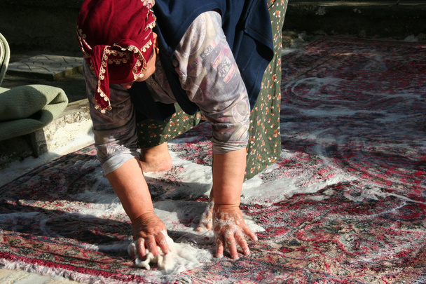 Washing the carpet - Фото, изображение