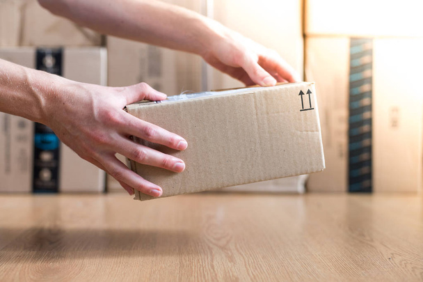 Cardboard box package, shipping concept: Delivering a parcel - Photo, Image