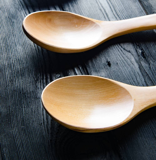 Wooden spoons arranged on table - Photo, Image
