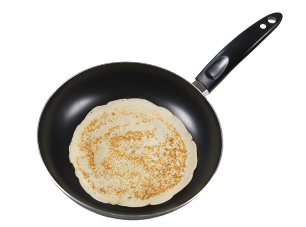 Frying a pancake cooking in a pan - Photo, Image