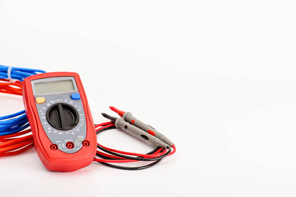Digital multimeter for different electrician measurement on white background. Copy space. - Photo, Image