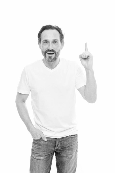 Fashion and confidence. Mature man pointing finger up. Mature fashion model in casual wear. Mature man with grey beard hair. Bearded senior man fit to modern fashion. Fashion for mature aged man - Foto, Imagen
