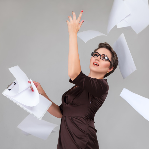 Woman throwing paper pages - Photo, Image