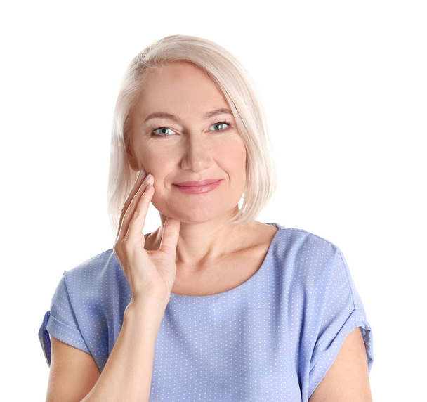Portrait of charming mature woman with healthy beautiful face skin and natural makeup on white background - Φωτογραφία, εικόνα