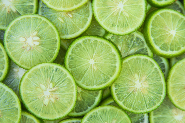 Owoców cytrusowych tła Plasterki Limonka  - Zdjęcie, obraz