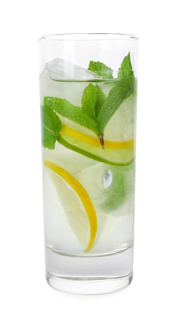 Glass of refreshing drink with citrus slices and mint on white background - Foto, afbeelding