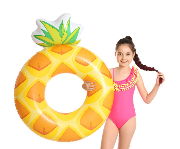 Cute little girl with bright inflatable ring on white background - Foto, Imagen