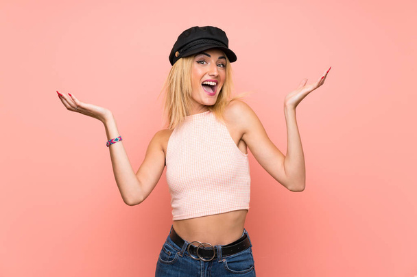 Young blonde woman with hat smiling a lot - Photo, image