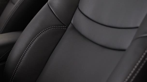 Black leather seat covers in the car. - Footage, Video