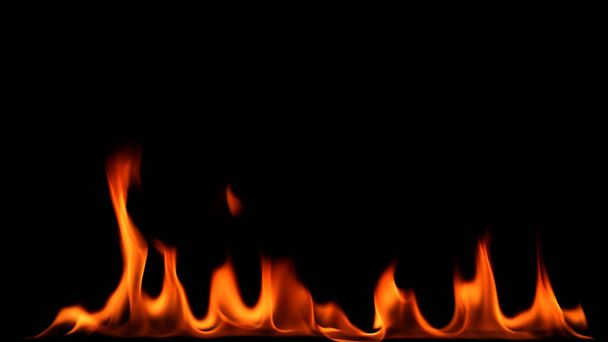 Closeup of Fire flames on black background - Foto, Bild