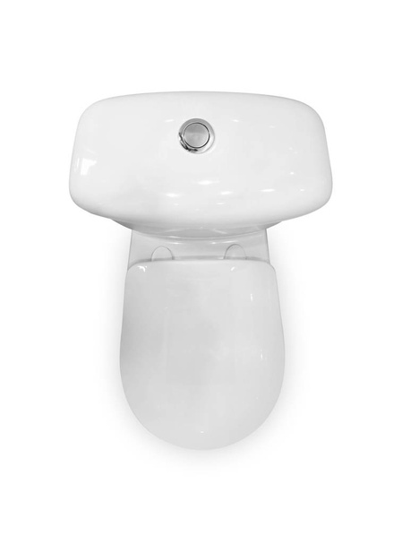 White ceramic toilet. Close the lid. The view from the top. Clos - Photo, image