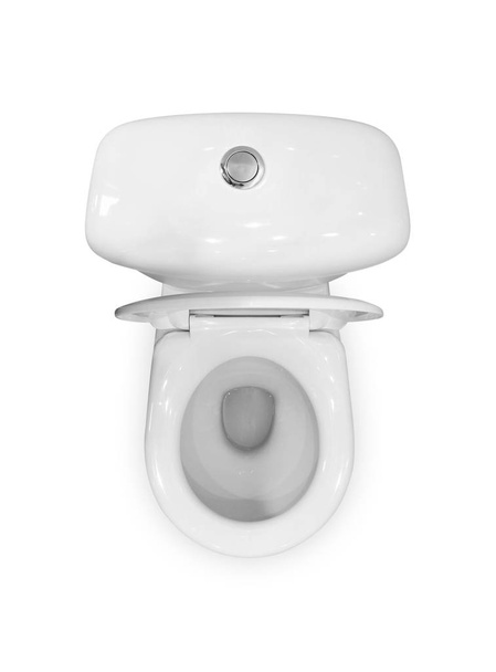 White ceramic toilet. Open lid. The view from the top. Close up. - Фото, изображение
